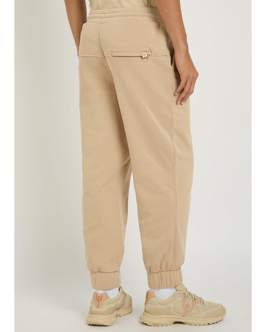Now You Live Natural Magna Logo-Embroidered Cotton-Blend Sweatpants for men