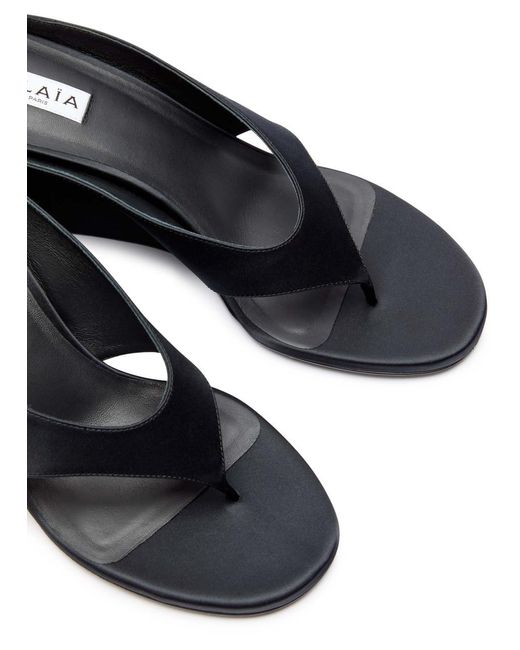 Alaïa Satin Wedge Thong Mules in Black | Lyst
