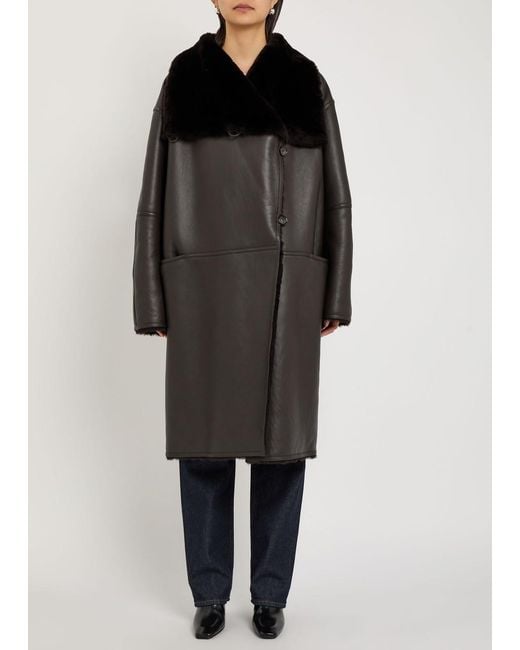 Totême  Black Panelled Shearling Wrap Coat