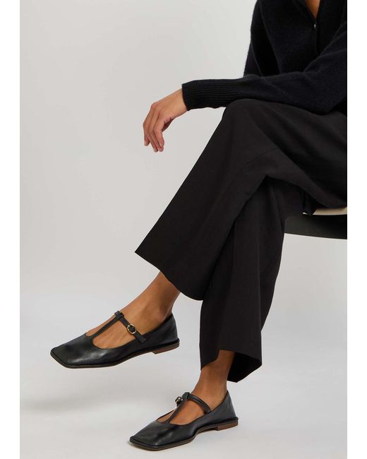 The Row Black Leather Mary Jane Flats
