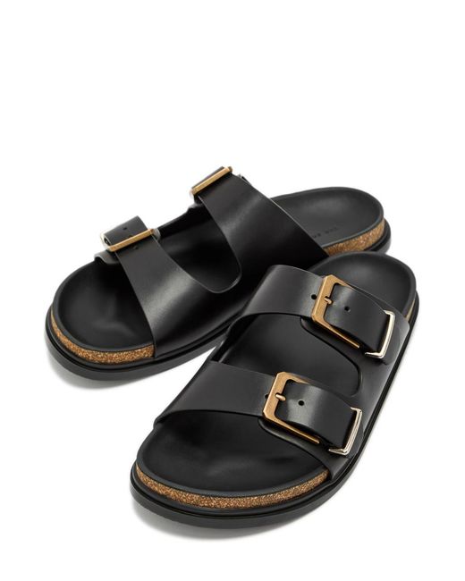 The Row Black Buckle Leather Slides