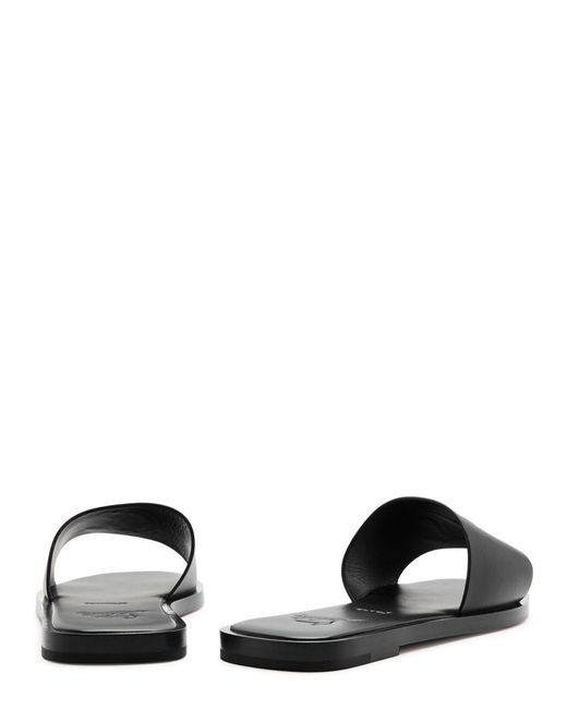 Christian Louboutin Black Cl Embossed Leather Sliders