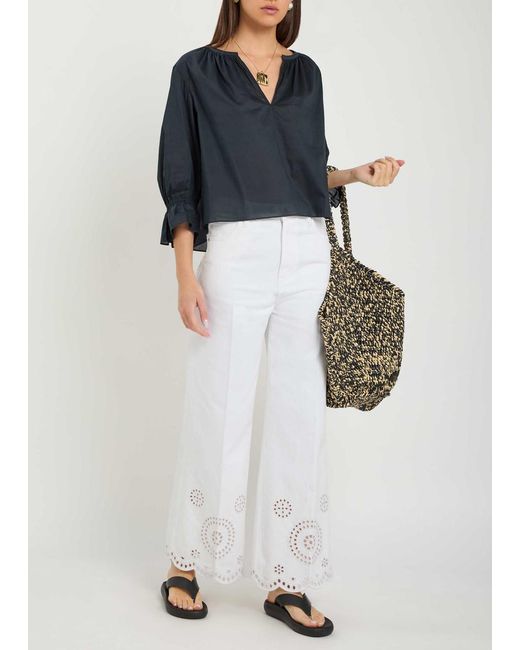 FRAME White The Eyelet Flare Embroidered Flared-Leg Jeans