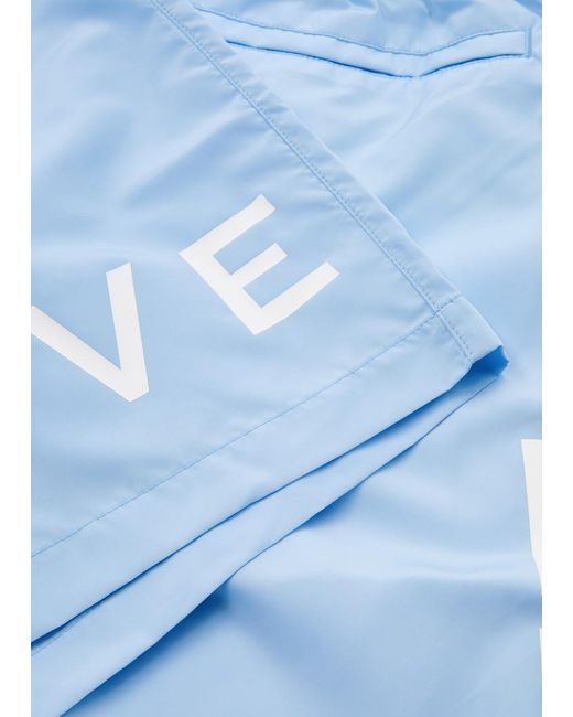 Givenchy Blue Logo-Print Shell Swim Shorts for men
