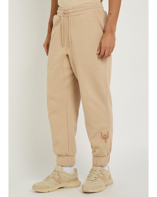 Now You Live Natural Magna Logo-Embroidered Cotton-Blend Sweatpants for men