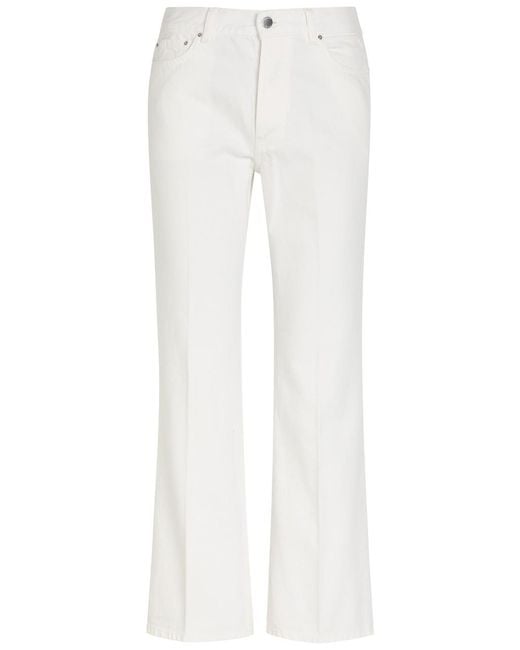 Totême White Kick Flared-Leg Denim Jeans