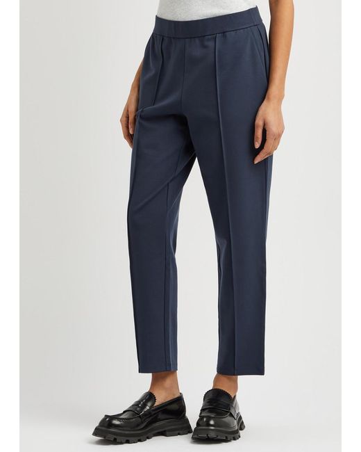 Eileen Fisher Blue Tapered-leg Stretch-jersey Trousers