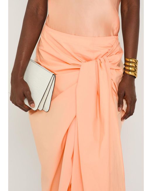 Khaite Orange Shay Asymmetric Cotton-Poplin Midi Wrap Skirt