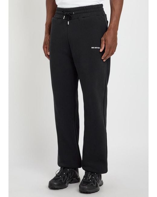 MKI Miyuki-Zoku Black Uniform Logo-Print Cotton-Blend Sweatpants for men