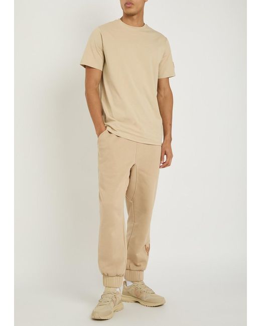 Now You Live Natural Magna Logo-Embroidered Cotton-Blend Sweatpants for men