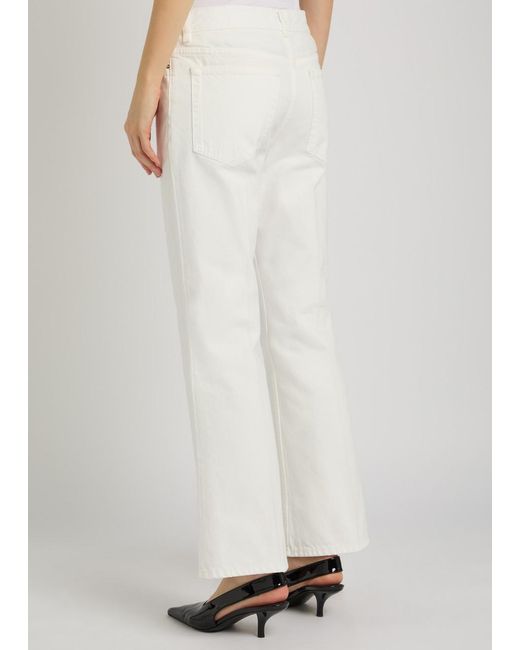 Totême White Kick Flared-Leg Denim Jeans