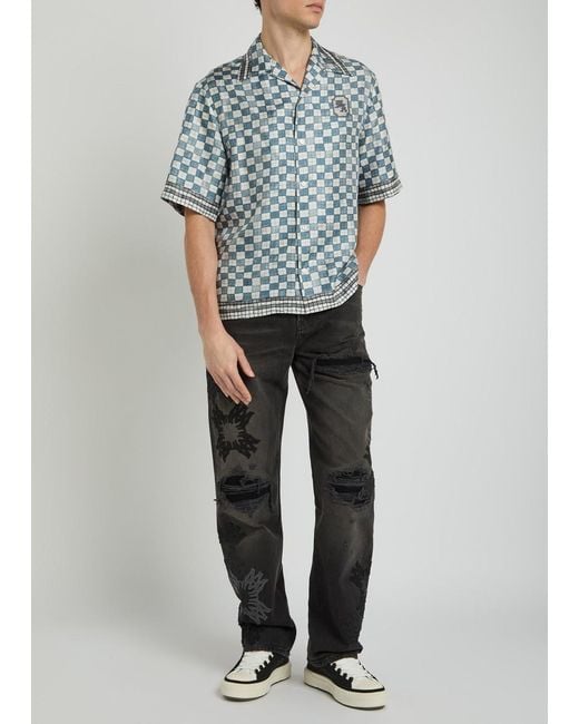 Amiri Black Distressed Logo-Appliquéd Straight-Leg Jeans for men