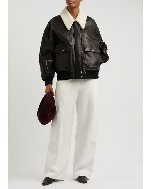 Khaite Black Shellar Shearling-Trimmed Leather Bomber Jacket