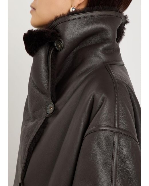 Totême  Black Panelled Shearling Wrap Coat