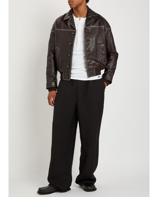 AMI Black Wide-Leg Woven Trousers for men