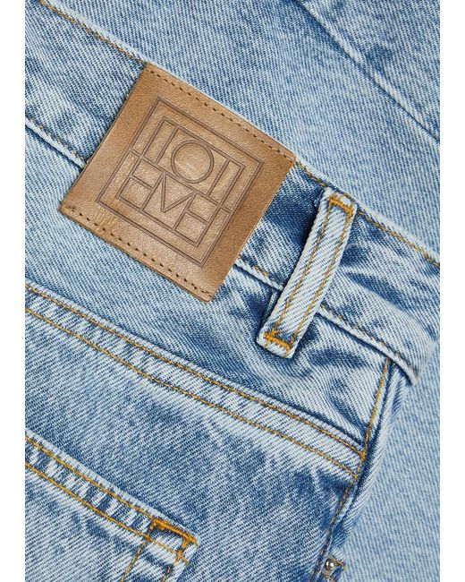 Totême Blue Longline Denim Board Shorts