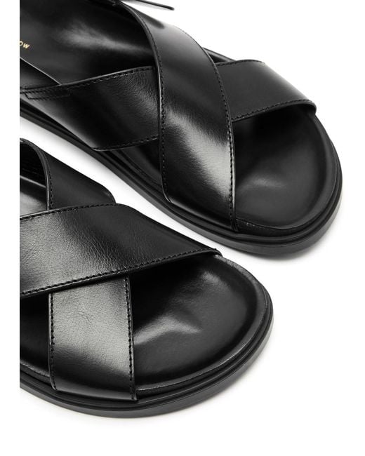 The Row Black Buckle Leather Sandals