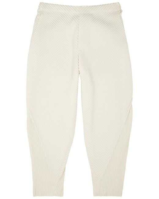 Issey Miyake White Homme Plissé Calla Lily Pleated Tapered Trousers for men