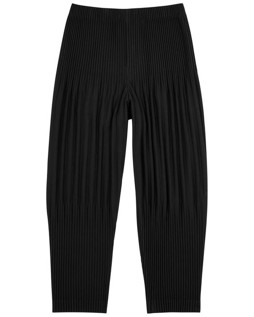 Issey Miyake Black Homme Plissé Pleated Cropped Trousers for men