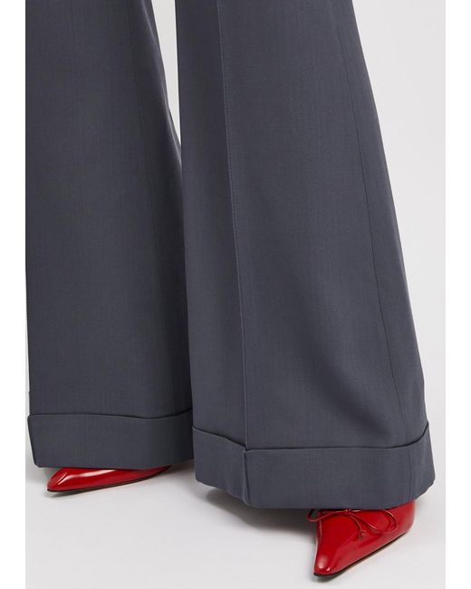 Acne Blue Flared-leg Woven Trousers