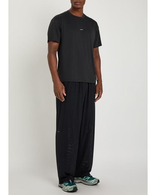 Satisfy Blue Space-O Perforated Stretch-Nylon Trousers for men