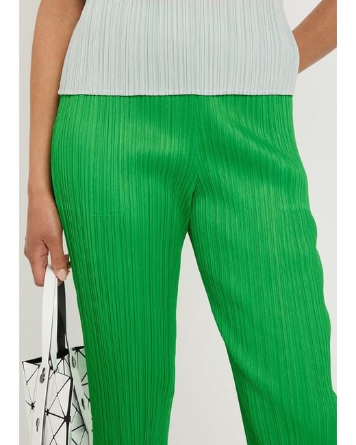 Pleats Please Issey Miyake Green Pleated Tapered-Leg Woven Trousers