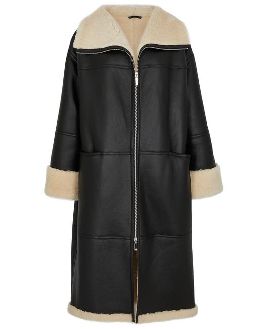 Totême Shearling-trimmed Leather Coat in Black | Lyst