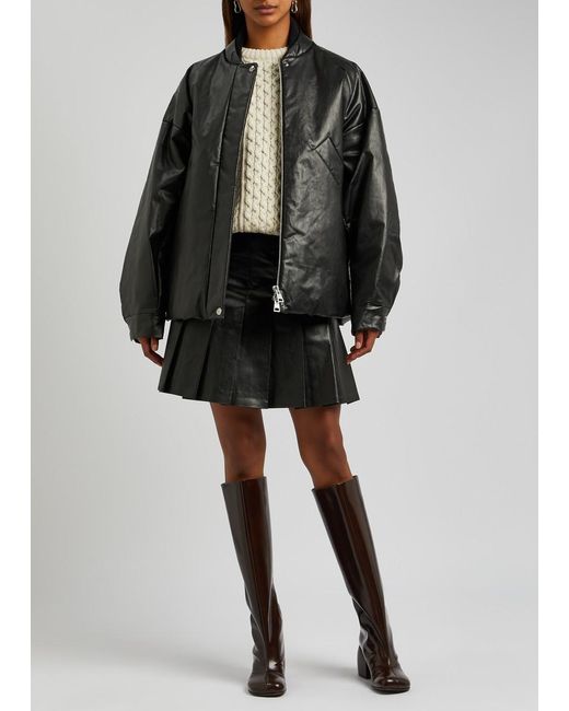 Kassl Black Pleated Faux Leather Mini Skirt