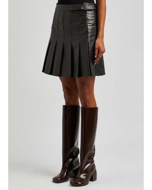 Kassl Black Pleated Faux Leather Mini Skirt