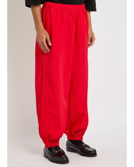 Willy Chavarria Red Bad Boy Shell Track Trousers for men