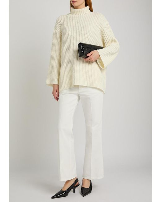 Totême White Kick Flared-Leg Denim Jeans