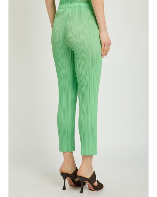 Pleats Please Issey Miyake Green Pleated Tapered-Leg Woven Trousers