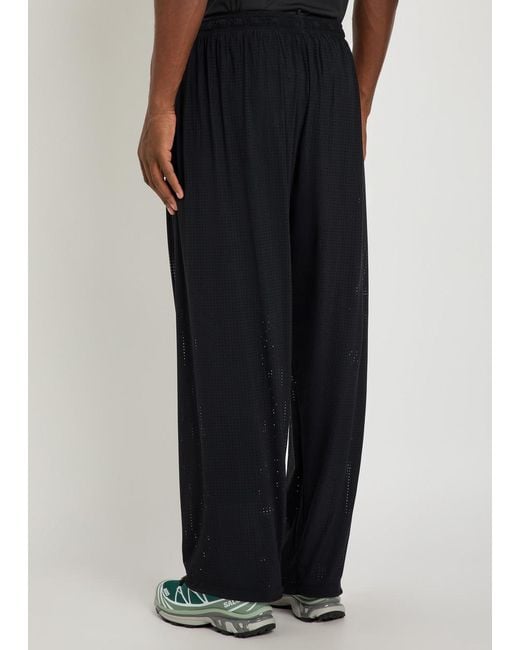 Satisfy Blue Space-O Perforated Stretch-Nylon Trousers for men