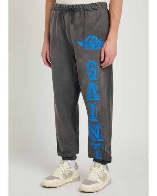 SAINT Mxxxxxx Blue Angel Of Death Printed Cotton Sweatpants for men