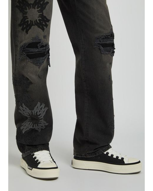 Amiri Black Distressed Logo-Appliquéd Straight-Leg Jeans for men