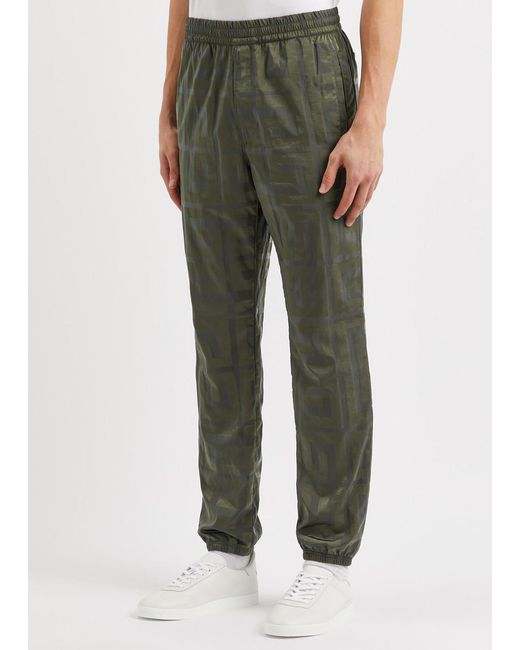 Givenchy Green 4g Logo-jacquard Shell Sweatpants for men