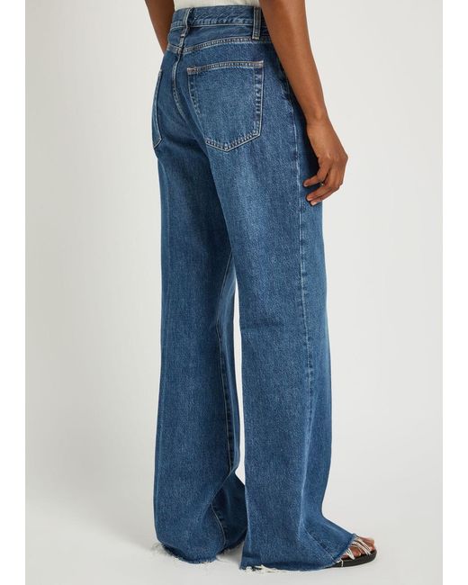 FRAME Blue The Lax Distressed Flared-Leg Jeans