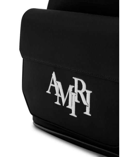 amiri-staggered-logo-nylon-backpack-in-black-for-men-lyst