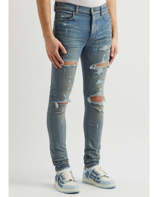 Amiri Blue Thrasher Plus Distressed Skinny Jeans for men