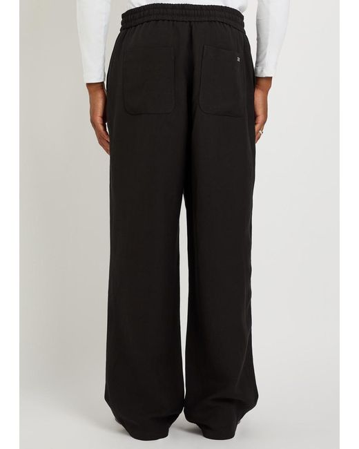 AMI Black Wide-Leg Woven Trousers for men