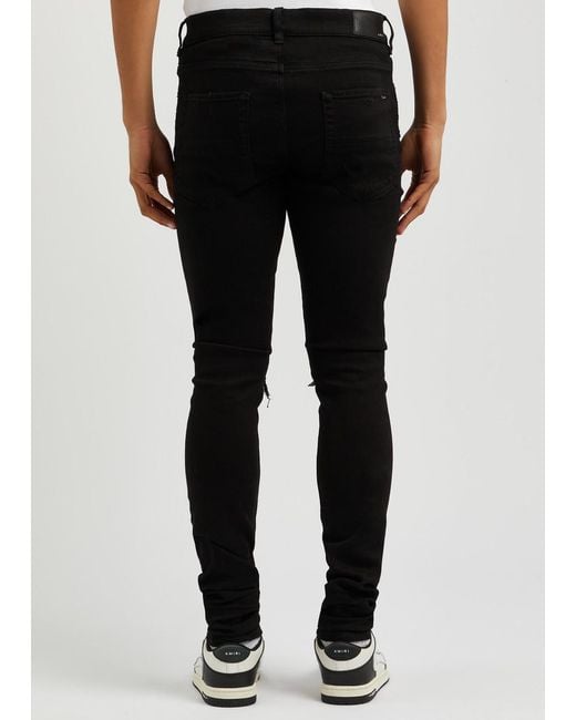 Amiri Black Mx1 Distressed Skinny Jeans for men