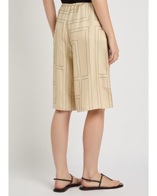 Totême Natural Logo-Monogrammed Silk Shorts