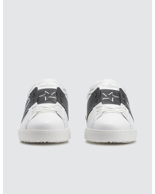 vltn white sneakers