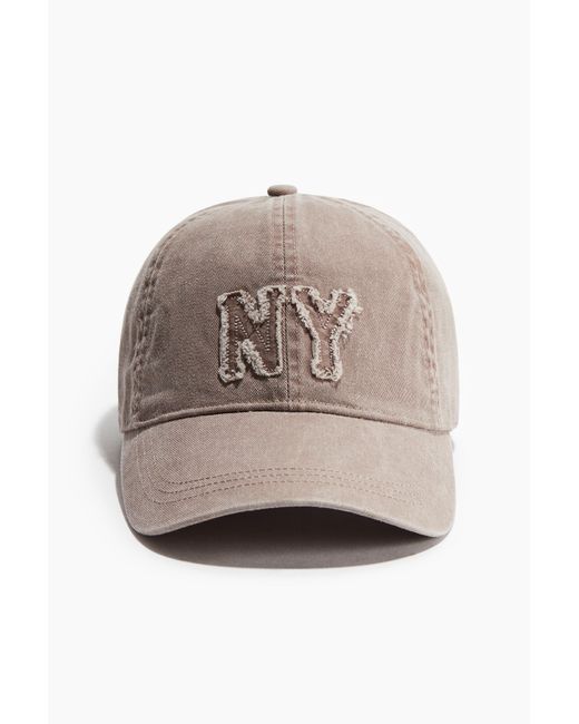 H&M Natural Baumwollcap mit Applikation