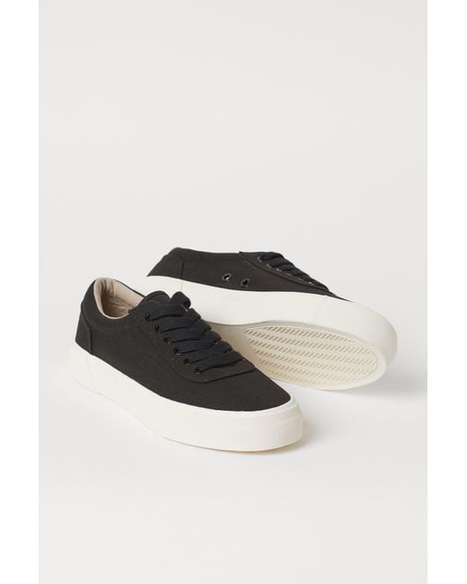 mens black canvas trainers