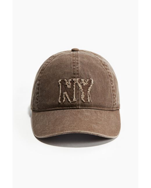 H&M Brown Baumwollcap mit Applikation