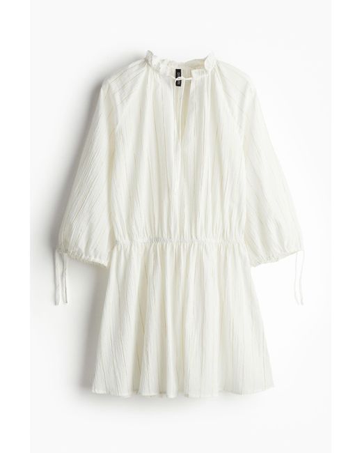 Robe tunique scintillante avec détails à nouer H&M en coloris White