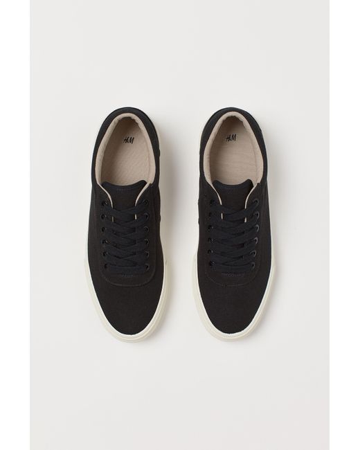 mens black canvas trainers