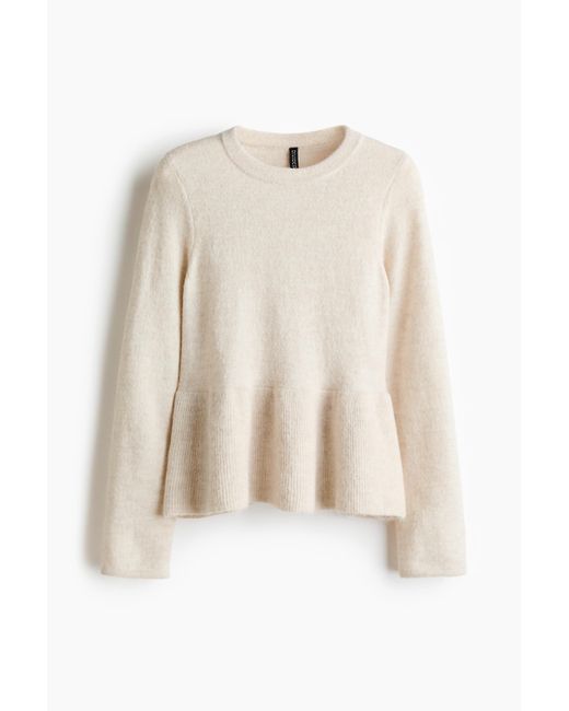 Pull Péplum H&M en coloris Natural