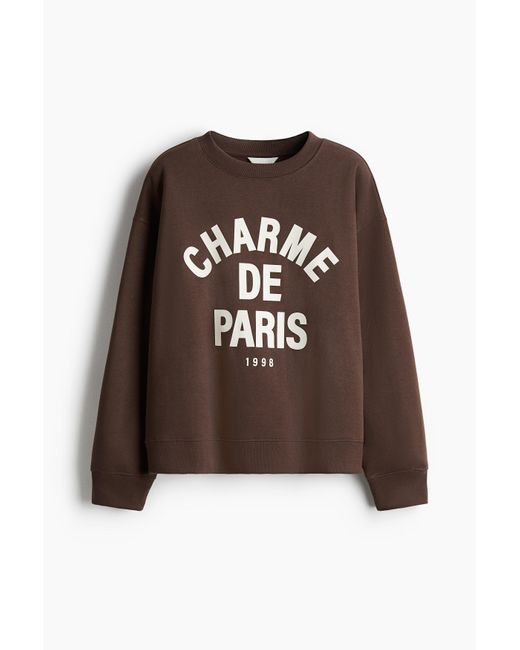 H&M Brown Sweatshirt mit Textmotiv